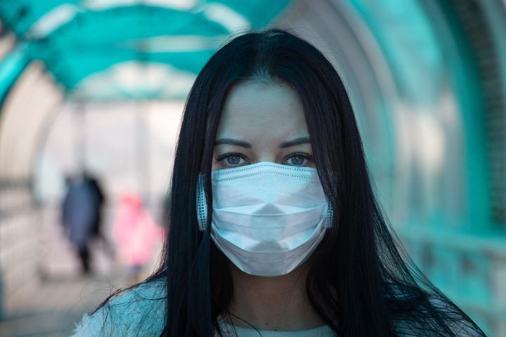 Woman in mask during COVID-19 pandemic.